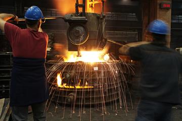 Pouring into sand mould